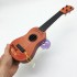 Đồ chơi đàn guitar thùng bằng nhựa 4 dây cước