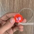 Vỉ đồ chơi banh tưng dây hình thú 30 trái
